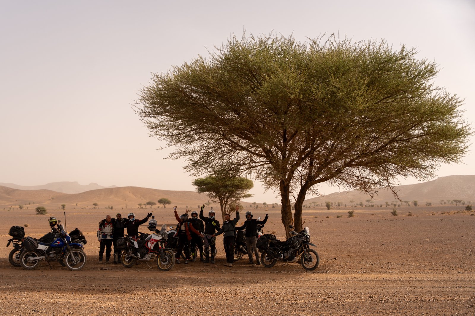 Riders crossing the desert plains of Morocco