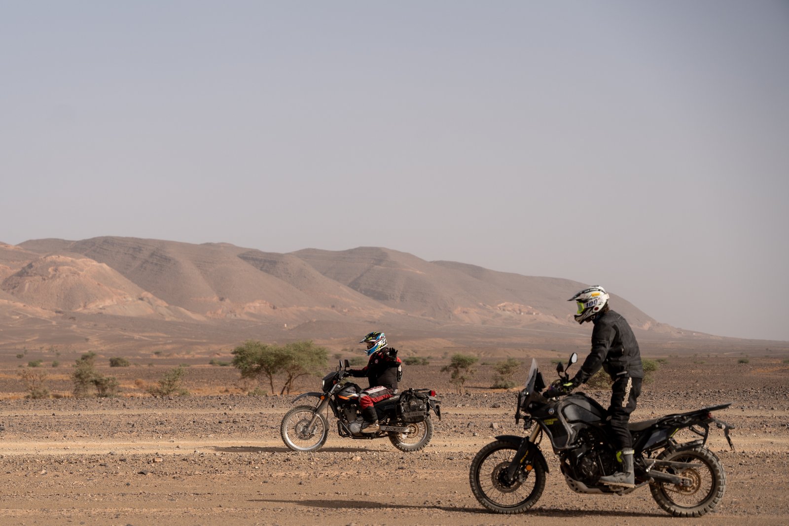 Riders greeting each other in the Moroccan desert